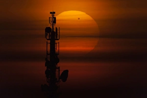 Backlit Silhouette Photography Drucke: Transit of Venus behind communication tower, Leipzig, Germany