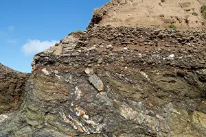 Western Europe Geology Drucke: An angular unconformity between folded Devonian age mudrocks and Quaternary age conglomerate