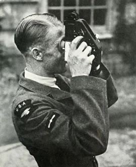 British Armed Forces WWII Drucke: Airman learning navigation during the Second World War, 1941. Creator: Charles Brown
