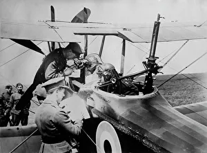 World War One Aviation History Drucke: British aviators getting instructions, 15 May 1918. Creator: Bain News Service