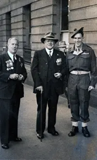 WWI Military Uniforms Drucke: Captain Frank Page MC (centre), Anzac Day march, year unknown. Creator: Unknown