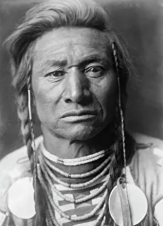 Traditional Tribal Clothing Drucke: Chief Child, c1908. Creator: Edward Sheriff Curtis