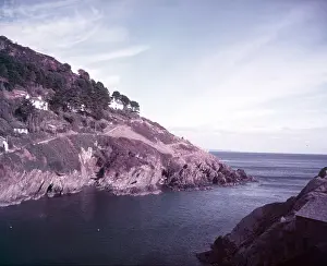 Cornish Fishing Village Drucke: Cliffs at Polperro, Cornwall, c1955. Creator: Arthur Charles Kirby Ware