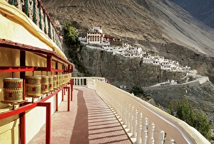 Buddhist Prayer Wheels Drucke: Diskit Monastery, Nubra Valley, Ladakh, India, 2023. Creator: Peter Thompson
