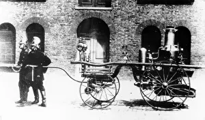 Black And White Colonial Images Drucke: Early Fire Engine, c1890s. Creator: Unknown