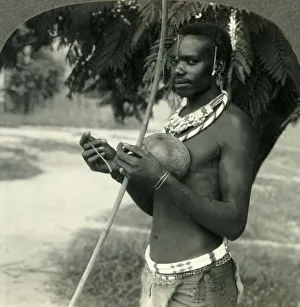 Colonialism In Africa History Drucke: The Finery of a Native Hunter in the Belgian Congo, Africa, c1930s. Creator: Unknown