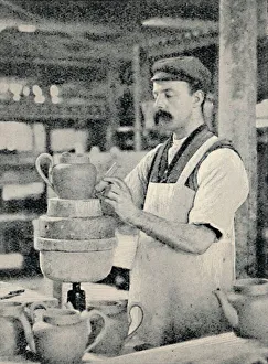 Industrial Manufacturing Process Drucke: Fixing Spout on a Teapot, c1917