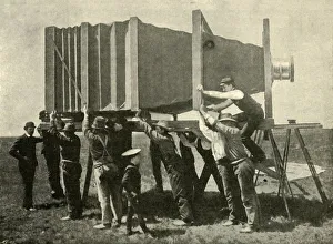 Antique Photography Equipment Drucke: Focussing The Gigantic Camera For Work, 1901. Creator: Unknown