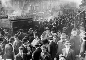 American Labor History Drucke: Garbage strike, crowd around carts, 1911. Creator: Bain News Service