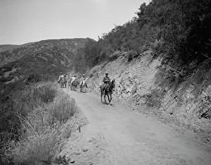 Vintage Horseback Riding Drucke: Hitting the trail, c.between 1910 and 1920. Creator: Unknown
