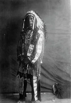 Traditional Tribal Clothing Drucke: Jack Red Cloud, c1907. Creator: Edward Sheriff Curtis