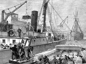 Illustrated London News Engravings Drucke: Loading the Warree, at Woolwich, with stores for the Ashantee War, 1873. Creator: Unknown