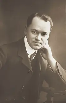 Heritage Art Collection UK Drucke: Malcolm Scott posing for a portrait, 1906. Creator: Unknown