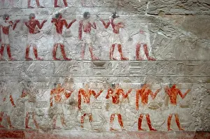 Hieroglyphic Writing System Drucke: Offering bearers, polychrome relief