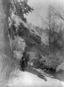 Native American Horses Drucke: Passing the cliff-Apsaroke, c1908. Creator: Edward Sheriff Curtis
