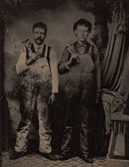 Zwei Schmiede im Overalltragen, 1880er Jahren. Erfinder unbekannt