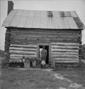Racial Inequality In Agriculture Drucke: Possibly: Young sharecropper and his first child