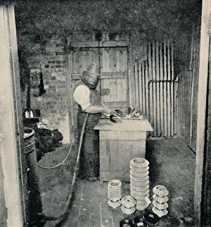 Black And White Factory Scene Drucke: Sand-blasting Gear Wheels, c1917