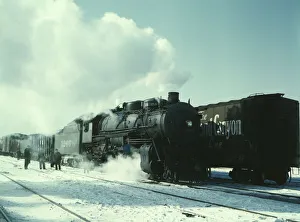 Der Zughalt Santa Fe R.R.-Gutzugszug über den Abgang zum Verlassen für die Pazifikküste von der Corith-Yard in Chicago (Illinois) im Jahr 1943 Künstler: Jack Delano