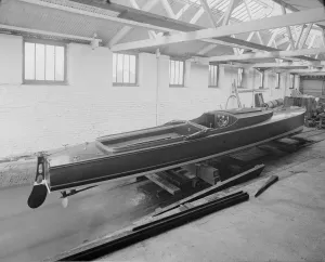 Water Transport In England Drucke: Saunders motor launch in yard, 1914. Creator: Kirk & Sons of Cowes