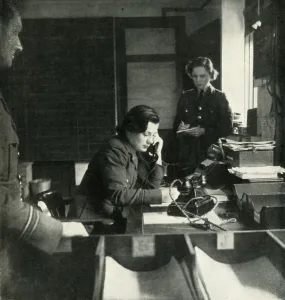 British Royal Air Force Women Drucke: A Station Intelligence Room, c1943. Creator: Cecil Beaton