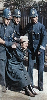 Suffragette Arrest Drucke: A suffragette being arrested, c1910s (1935). Creator: Unknown