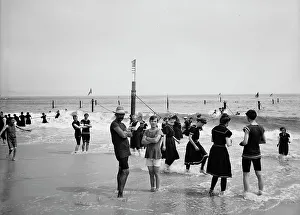 Early 20th Century Leisure Activities Drucke: Surf bathing, between 1900 and 1905. Creator: Unknown