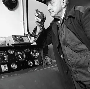 Black And White Train Photos Drucke: Train driver on an intercom, South Yorkshire, 1964. Artist: Michael Walters