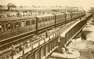 Black And White Train Images Drucke: A Train Passing Over The Bridge, c1930. Creator: Unknown