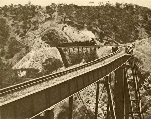 Monochrome Train Photography Drucke: Train Passing Over Viaduct, Mount Lofty Range, South Australia, 1930. Creator: Unknown