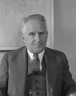 Walter E. Packard, handender Direktor der ländlichen Umsiedlungsdienstabteilung, 1936. Schöpferin: Dorothea Lange