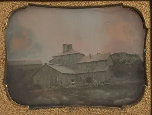 Mühle oder Lagerhaus mit vertikaler Bretterverkleidung aus Holz, Ende des 19. Jahrhunderts. Ersteller unbekannt