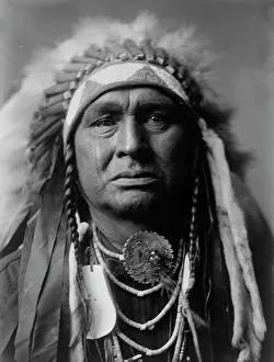 Traditional Tribal Clothing Drucke: White Man Runs Him, Apsaroke, c1908. Creator: Edward Sheriff Curtis