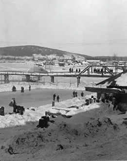 Ice Skating In Winter Drucke: Winter bridge over river, between c1900 and c1930. Creator: Unknown
