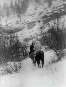 Black And White Winter Landscape Drucke: Winter hunter[s]-Apsaroke, c1908. Creator: Edward Sheriff Curtis
