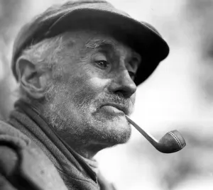 00040 Drucke: Charakterstudien - Alter Mann raucht Tabakstabak mit Hut, Cap (Circa 1933)