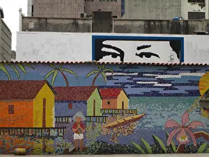 Drucke von Ein Mural in Caracas, Venezuela zeigt Hugo Chavez beim Blick auf die Stadt Straßenkunst Graffiti Drucke: Hugo Chavez beobachtet Caracas, Venezuela