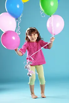 Kind mit Luftballons