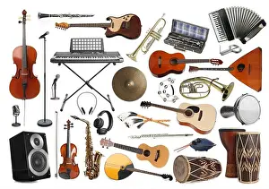 Sammlung verschiedener Musikinstrumente auf weißem Hintergrund.