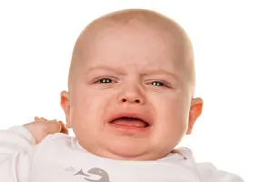 Gesicht eines weinenden, traurigen Babys.