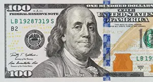 Ein Bild eines Teils einer 100-Dollar-Note.
