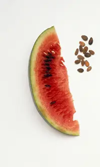 Stück Wassermelone und Samen.