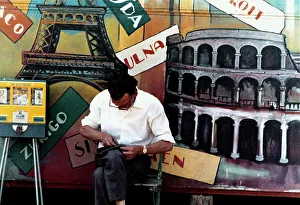 City View Photography Drucke: Man sitting in front of a painted panel