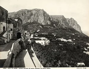 Italian Rocky Coastline Drucke: Partial view of the Isle of Capri with Mount Solaro in the background
