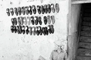 Ein Schuhverkäufer in Rom