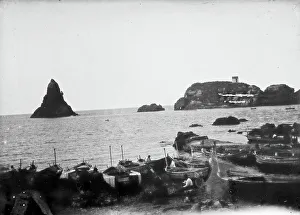 Small Boat Transportation Methods Drucke: A view of the rocks of the Cyclops in Aci Trezza