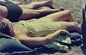 Woman In Swimsuit Drucke: Woman in swimsuit sunbathing