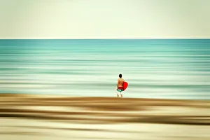 Peaceful Ocean Views Drucke: Surfer at the beach