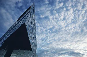 Cloudy Day Cityscape Drucke: Architectural detail of a skyscraper against cloudy sky