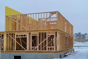 Residential Building Structure Drucke: Building frame structure on a new development timber frame for a progressing house